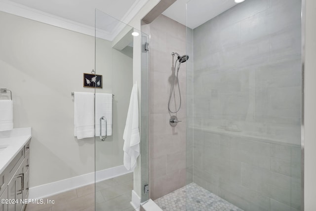 bathroom featuring crown molding, walk in shower, and vanity