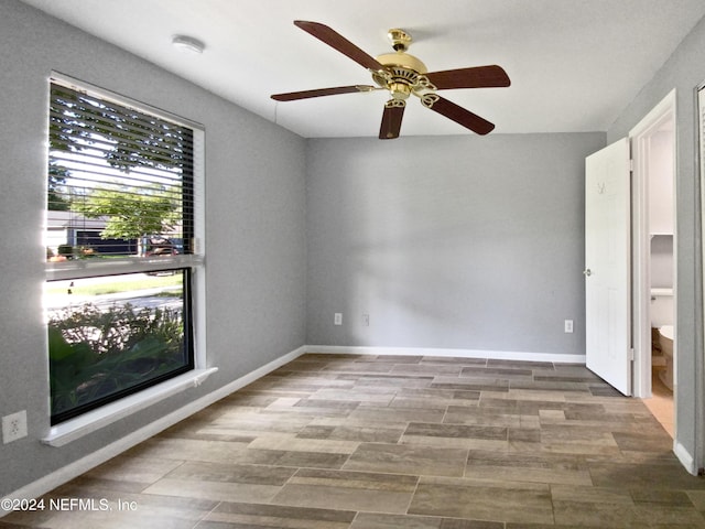 empty room featuring ceiling fan