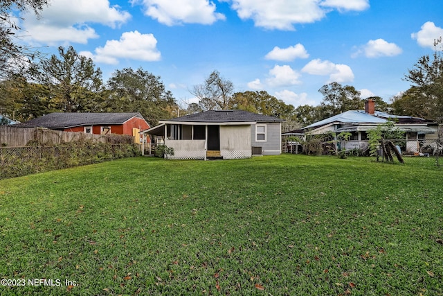 exterior space with a yard