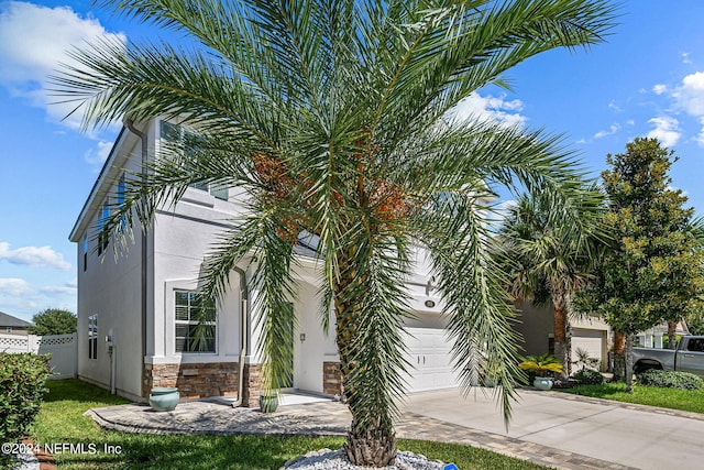 view of front of property featuring a garage