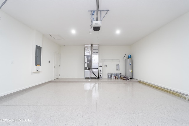 garage featuring electric panel, electric water heater, and a garage door opener