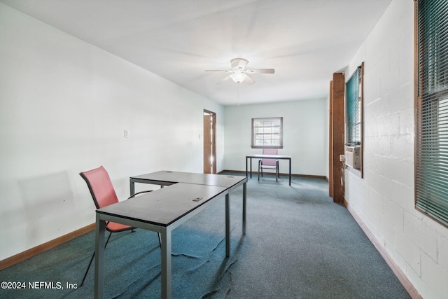 carpeted office with ceiling fan