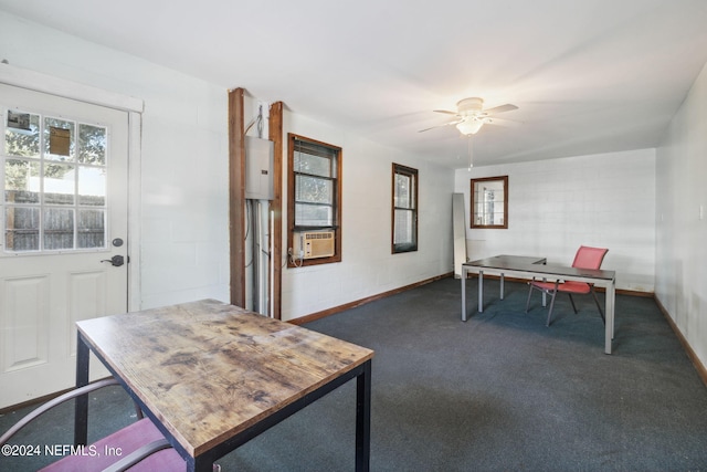 carpeted office space with cooling unit, ceiling fan, and electric panel