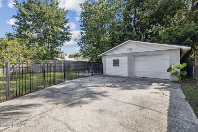 garage featuring a yard