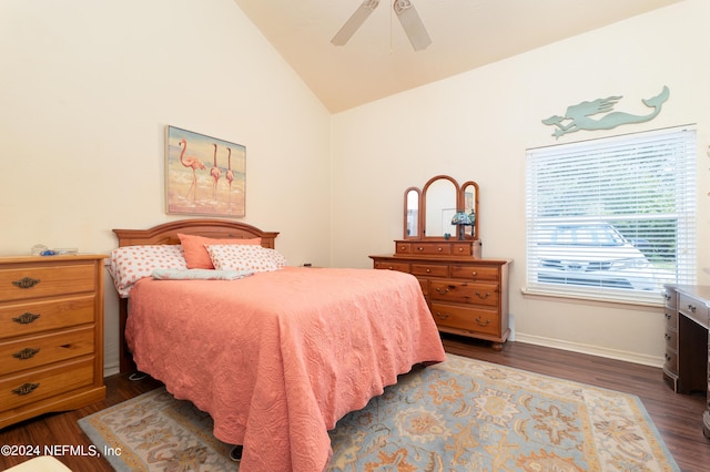 bedroom with a ceiling fan, lofted ceiling, dark wood finished floors, and baseboards