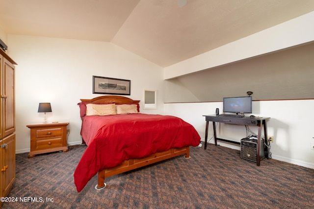 carpeted bedroom featuring lofted ceiling