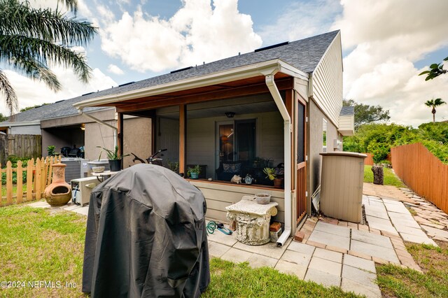 view of front facade with central air condition unit and a patio area