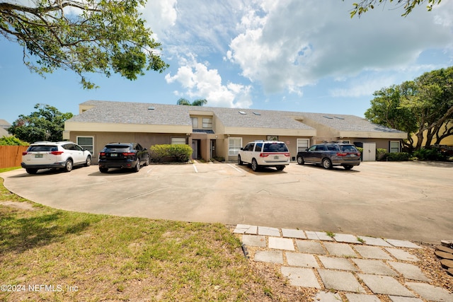 view of front of house featuring uncovered parking