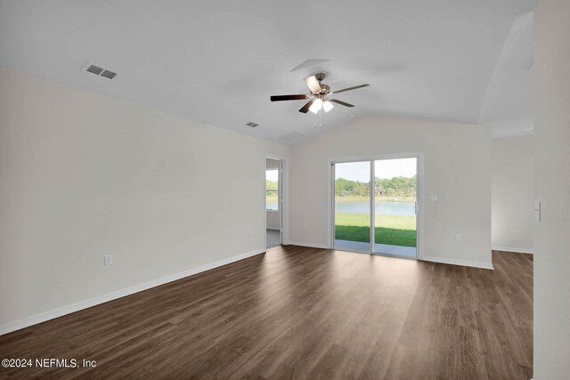 unfurnished room with ceiling fan, wood-type flooring, and vaulted ceiling