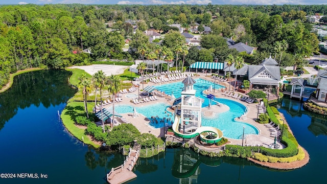 birds eye view of property with a water view