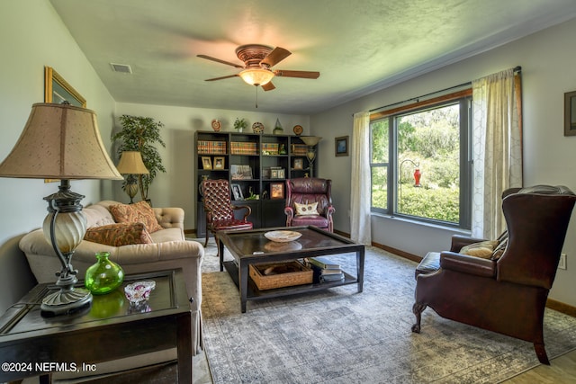 living room featuring ceiling fan