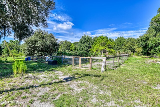 view of yard featuring fence