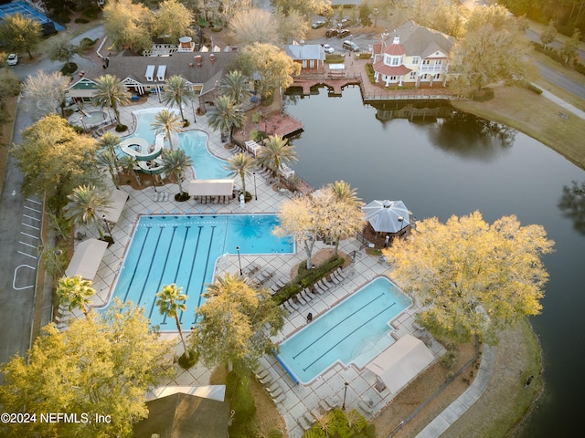 drone / aerial view with a water view