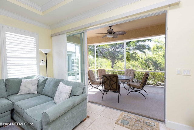 sunroom with plenty of natural light and ceiling fan