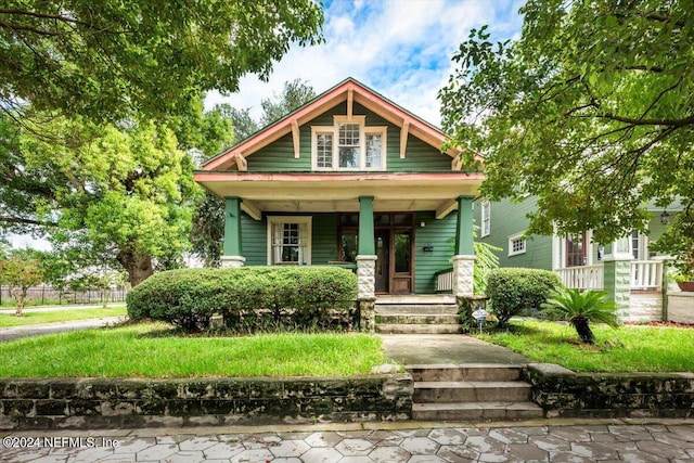 view of front of property featuring covered porch