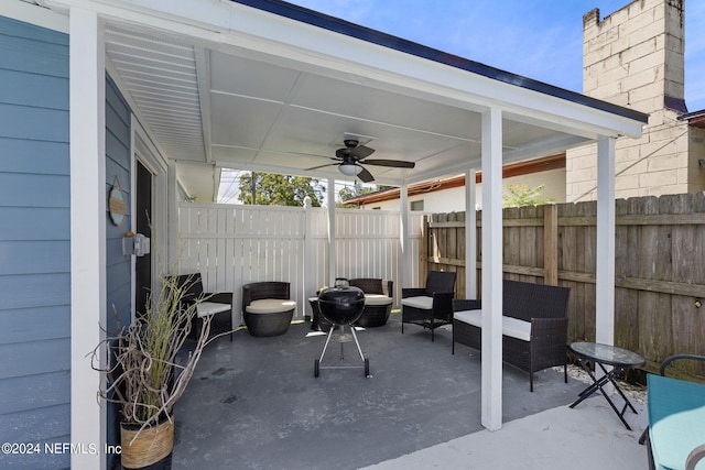 view of patio featuring ceiling fan