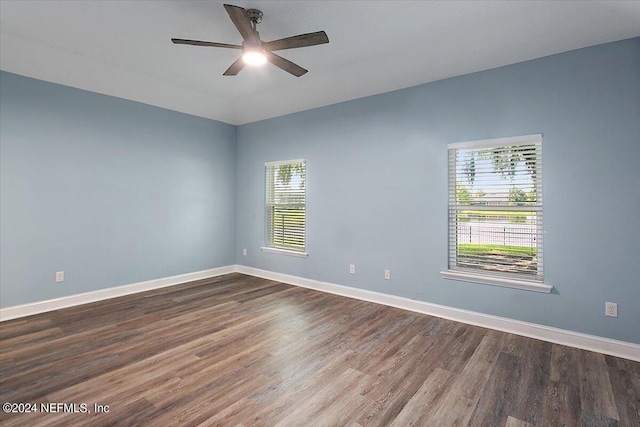 empty room with wood-type flooring and ceiling fan