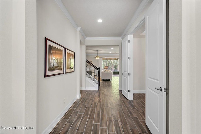 corridor with dark wood-type flooring and ornamental molding