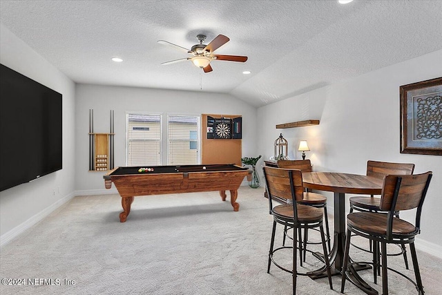 game room featuring light colored carpet, a textured ceiling, billiards, and lofted ceiling