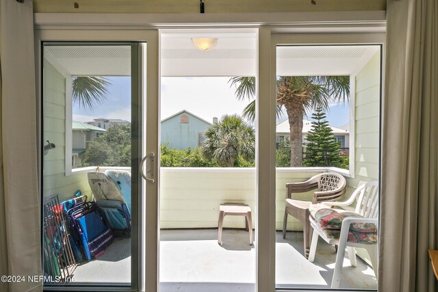 6300 A1A Unit A44U, Saint Augustine, FL 32080 - doorway to outside with concrete flooring