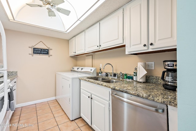 laundry area featuring baseboards, ceiling fan, light tile patterned floors, laundry area, and a sink