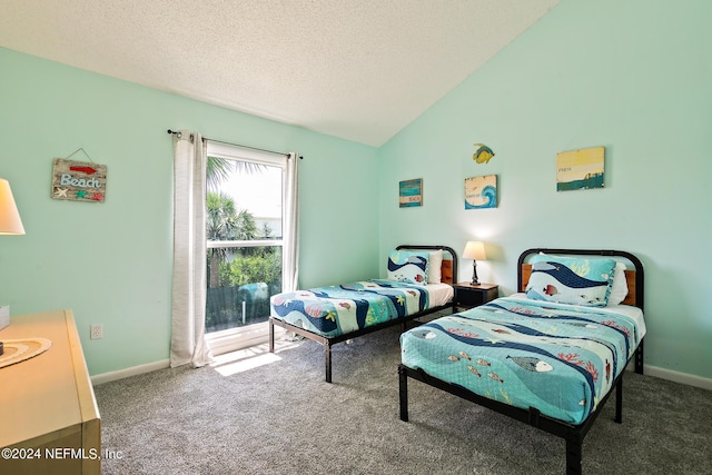 carpeted bedroom with a textured ceiling and lofted ceiling