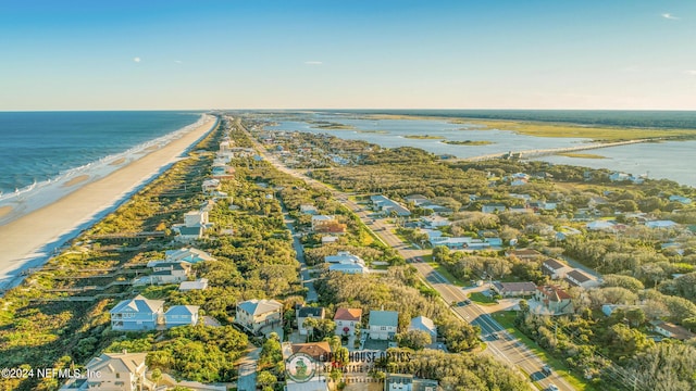 aerial view featuring a water view and a beach view