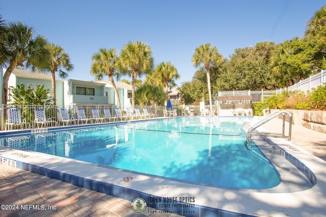 view of pool featuring a patio