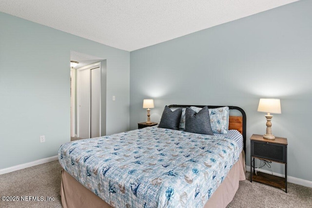 bedroom featuring baseboards and light colored carpet