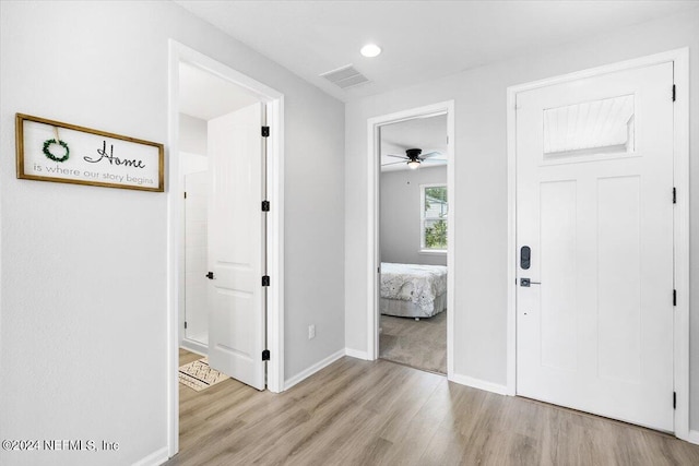 interior space featuring light hardwood / wood-style flooring and ceiling fan