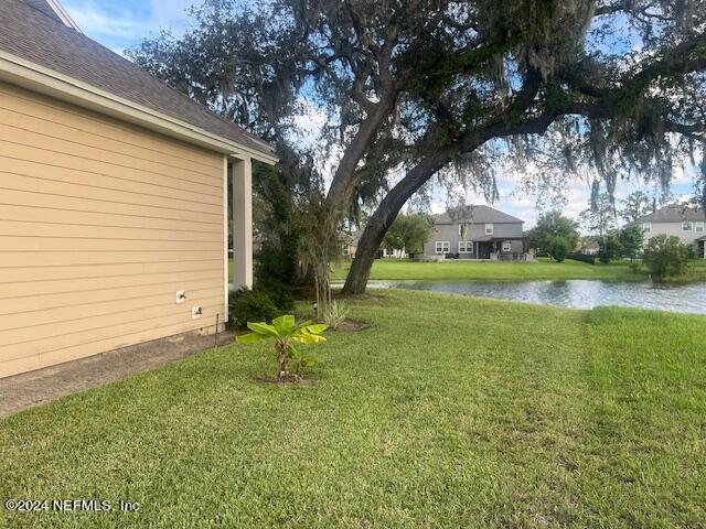 view of yard with a water view