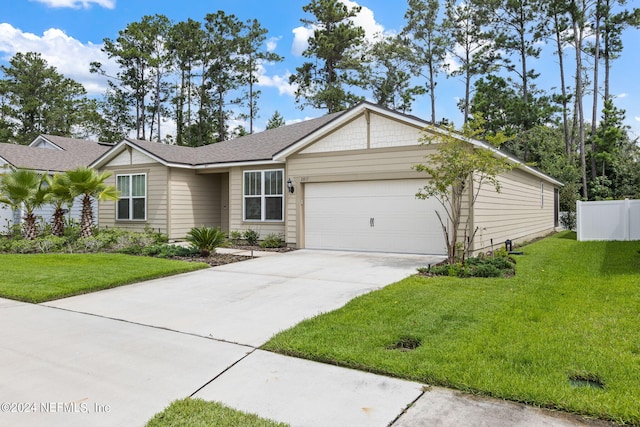 single story home with a garage and a front yard