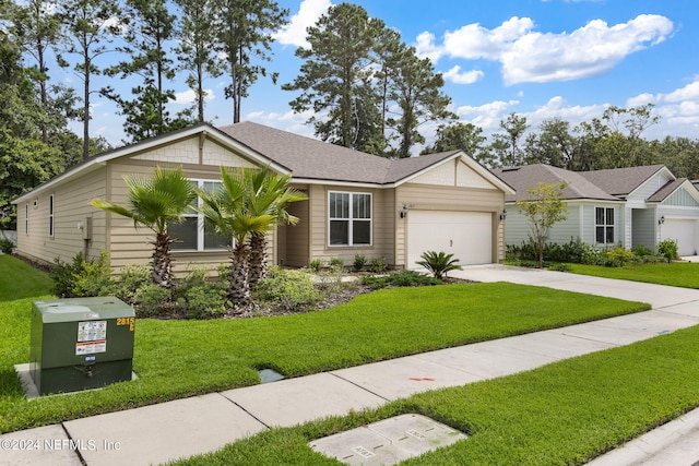 single story home featuring a garage and a front yard