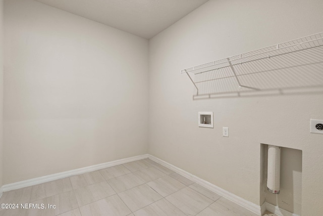 laundry room with hookup for an electric dryer and hookup for a washing machine