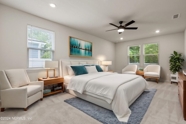 carpeted bedroom with ceiling fan