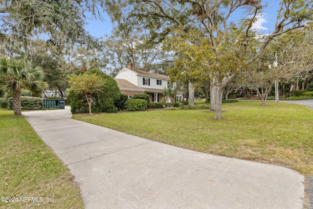 view of front of home with a front lawn