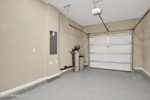 garage featuring electric panel, a garage door opener, and baseboards