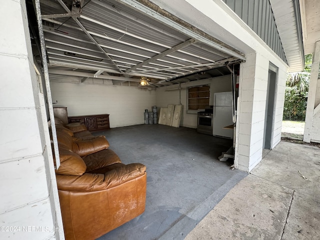 basement with white fridge