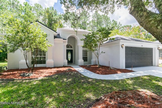 view of front of home featuring a garage