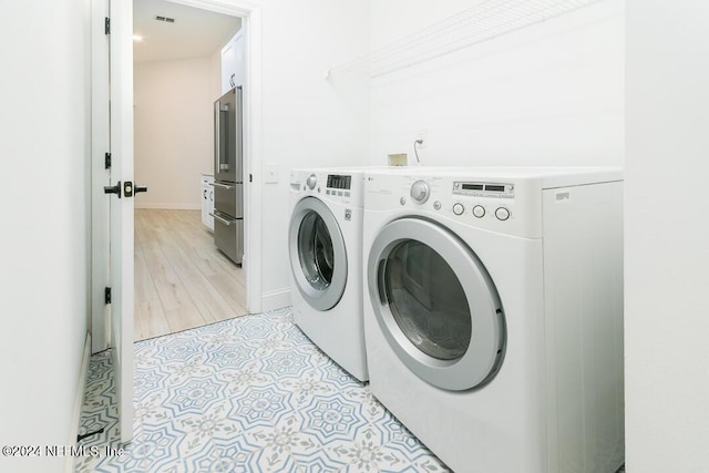 laundry area featuring washer and dryer