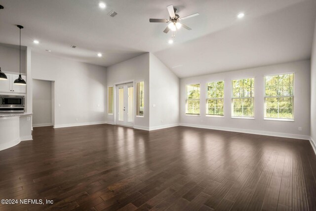 36247 Pitch Ln, Hilliard, FL 32046 - unfurnished living room with dark wood-style floors, ceiling fan, and visible vents