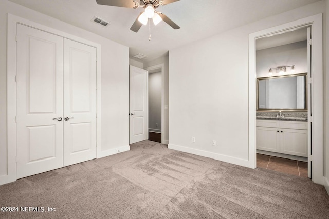 36247 Pitch Ln, Hilliard, FL 32046 - unfurnished bedroom with carpet floors, a closet, visible vents, and ensuite bathroom