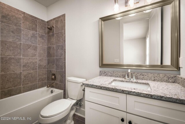 36247 Pitch Ln, Hilliard, FL 32046 - bathroom featuring bathtub / shower combination, vanity, and toilet