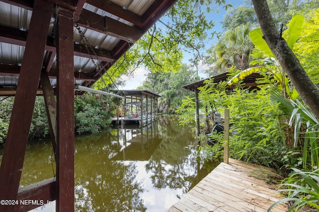 view of dock with a water view