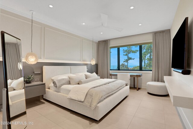 tiled bedroom with ornamental molding