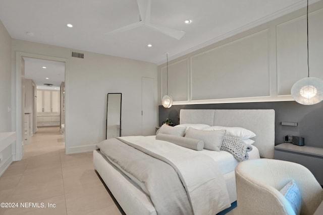 bedroom with light tile patterned flooring and crown molding