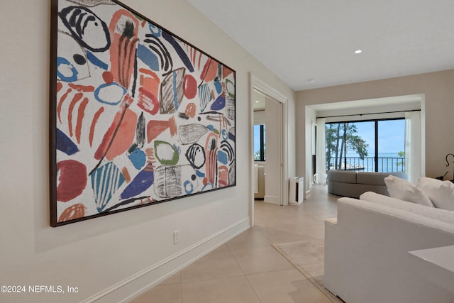 hallway with light tile patterned flooring