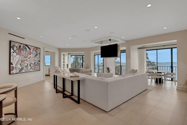 living room with light tile patterned floors