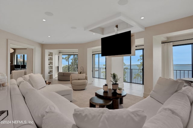 tiled living room with plenty of natural light