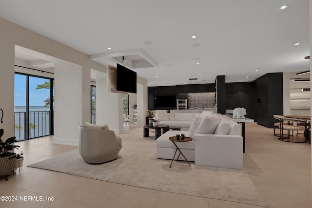 living room with light tile patterned floors